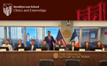 A group of people sitting behind a panel that reads "The Council City of New York" with a title banner at the top that says "Brooklyn Law School Clinics and Externships."
