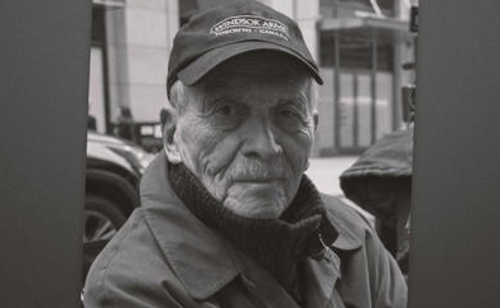 A black-and-white photo of Brooklyn Law School Alumnus David Yarnell wearing a baseball hat.