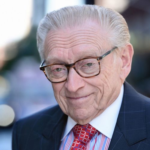 headshot of Larry Silverstein’55 in a suit and tie and glasses
