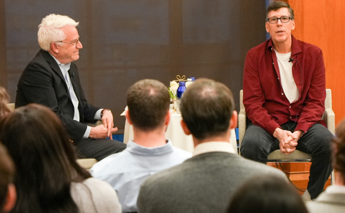 Brooklyn Law School Dean David Meyer (left) and alumnus Michael Levy (right) speak in in front of students at the school's Business Boot Camp.