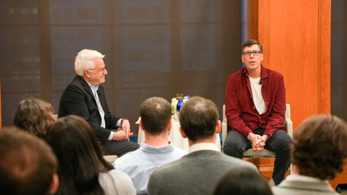 Brooklyn Law School Dean David Meyer (left) and alumnus Michael Levy (right) speak in in front of students at the school's Business Boot Camp.